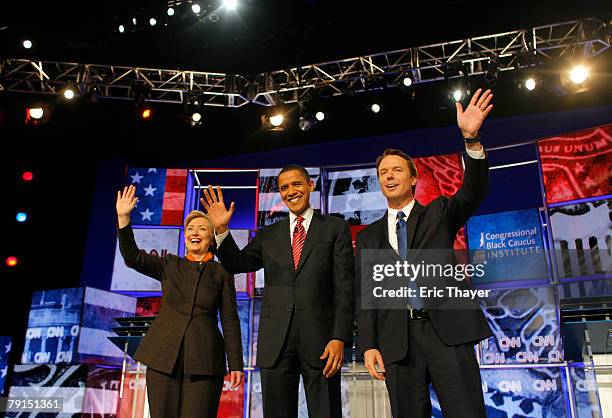 Democratic presidential hopefuls Sen. Hillary Clinton , Sen. Barack Obama and former Sen. John Edwards stand before the start of a debate at the...