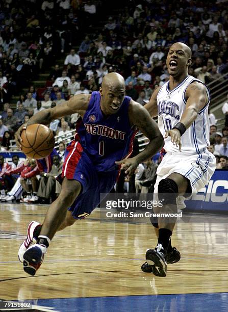 Chauncey Billups of the Detroit Pistons drives past Keith Bogans of the Orlando Magic at Amway Arena on January 21, 2008 in Orlando, Florida. NOTE TO...