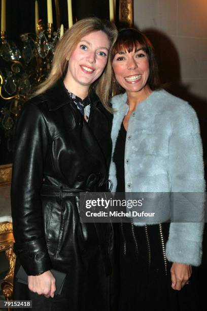 Prada executive Mathilde Agostinelli and her sister jewelry designer Victoire de Castellane attend the Louis Vuitton unveiling of a new collection of...