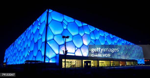 Night view of the National Aquatic Center, known as the Water Cube, as it is lit up on January 21, 2008 in Beijing, China. The venue can hold 17,000...