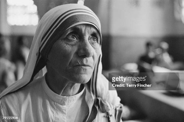 Albanian Roman Catholic nun and founder of the Missionaries of Charity, Mother Teresa at a hospice for the destitute and dying in Kolkata , India,...