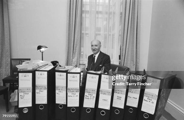 English judge Lord Denning in his office with documents relating to his report on the Profumo Affair, 14th August 1963.