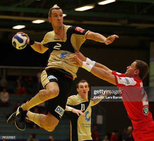 Pascal Hens of Germany is seen in action with Hannes Jon Jonsson of Iceland during the Men's Handball European Championship main round Group II match...