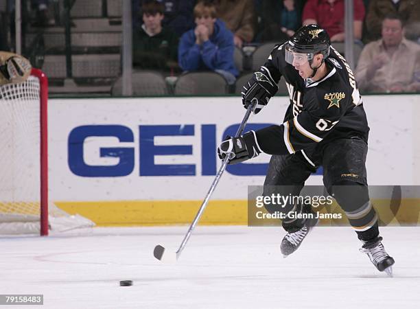 Mike Ribeiro of the Dallas Stars makes a pass to a teammate against the Columbus Blue Jackets at the American Airlines Center on January 19, 2008 in...