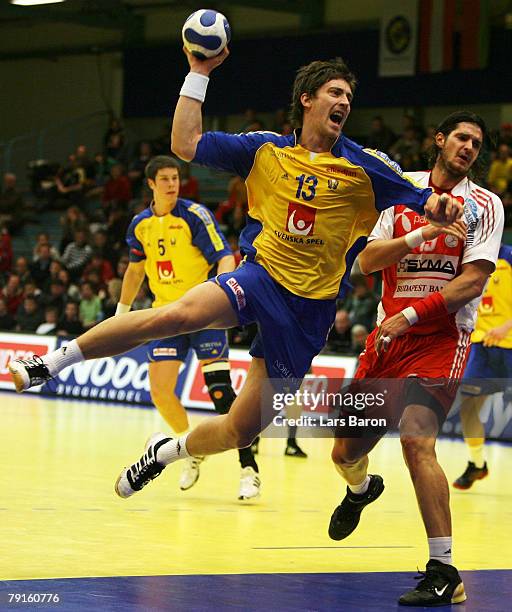 Marcus Ahlm of Sweden in action with Laszlo Nagy of Hungary during the Men's Handball European Championship main round Group II match between Hungary...