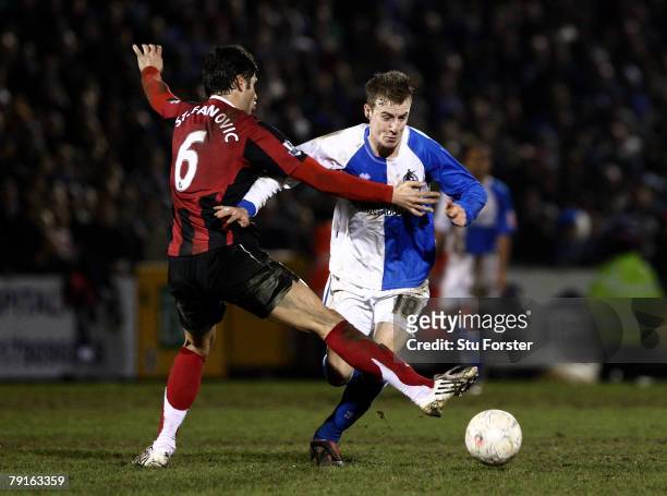 Fulham defender Dejan Stefanovic fouls Chris Lines and is sent off during the FA Cup sponsored by E.ON 3rd Round Replay between Bristol Rovers and...