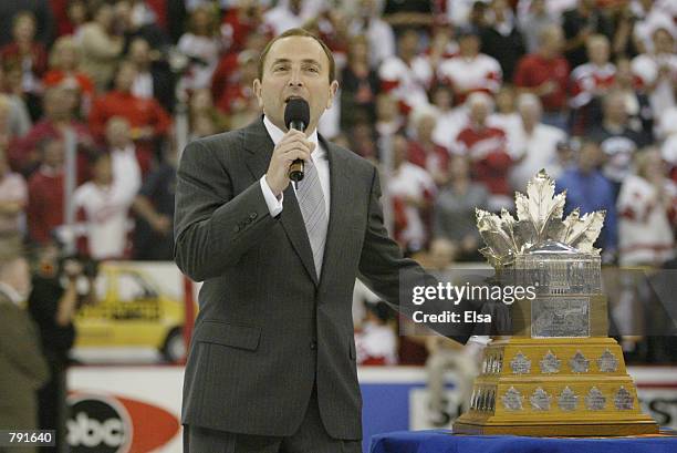 Commisioner Gary Bettman presents the Conn Smythe Trophy to playoff MVP Nicklas Lidstrom of the Detroit Red Wings after eliminating the Carolina...