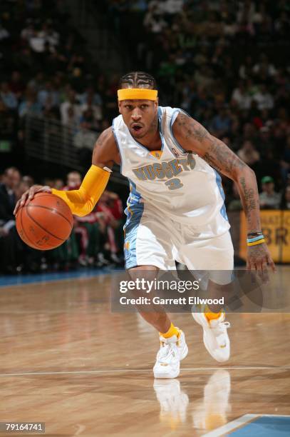 Allen Iverson of the Denver Nuggets drives to the basket during the game against the Milwaukee Bucks at the Pepsi Center on December 26, 2007 in...