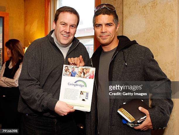 Actor Esai Morales poses with the CaringBridge display at the Gibson Guitar celebrity hospitality lounge held at the Miners Club during the 2008...
