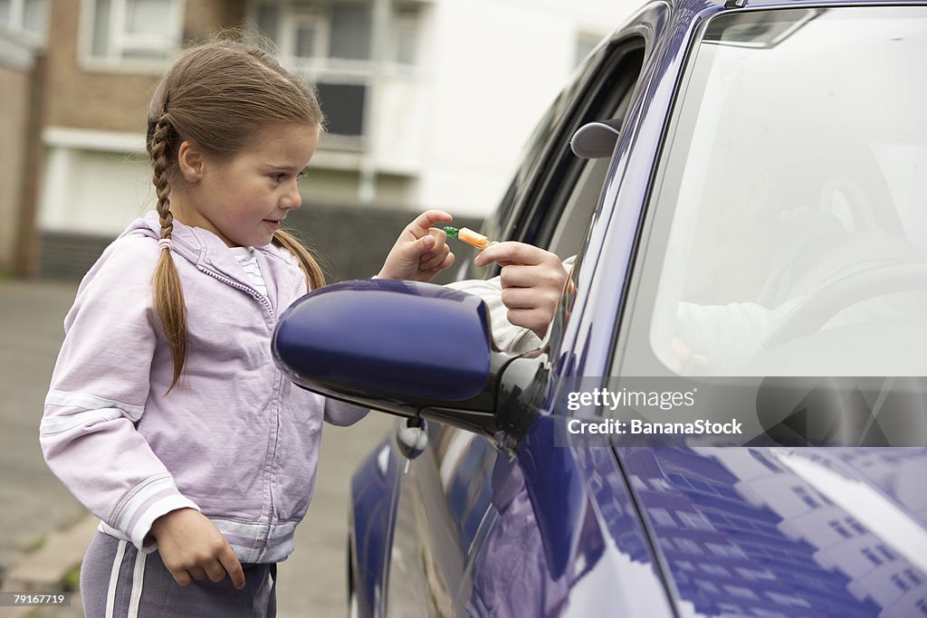 Out Getting Candy Girl Taking Candy From Stranger High-Res Stock Photo - Getty Images