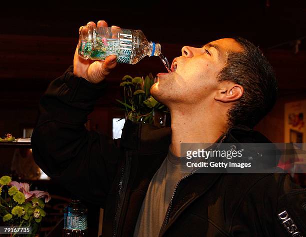 Actor Esai Morales poses with the Fiji display at the Gibson Guitar celebrity hospitality lounge held at the Miners Club during the 2008 Sundance...