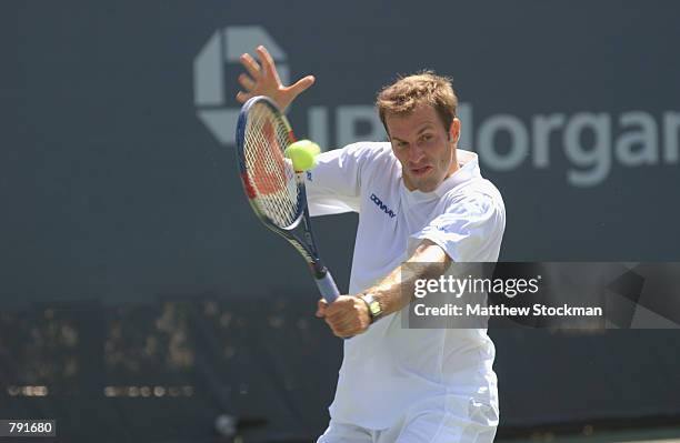 Greg Rusedski of Great Britain hits a backhand during his US Open match against Mariano Zabaleta of Argentina at the USTA National Tennis Center, on...