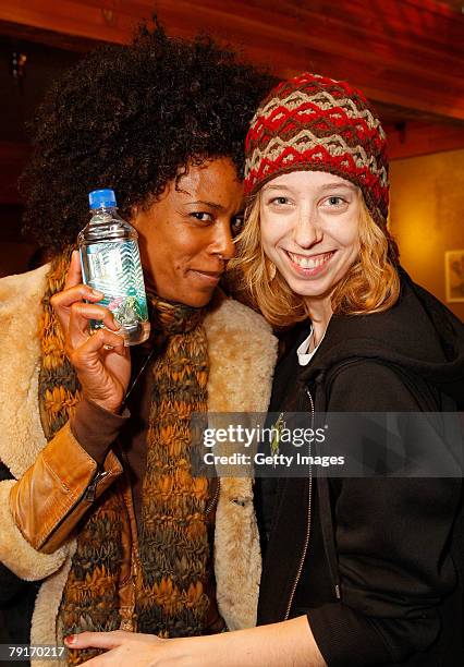 Actress Leslie Silva poses with the Fiji display at the Gibson Guitar celebrity hospitality lounge held at the Miners Club during the 2008 Sundance...