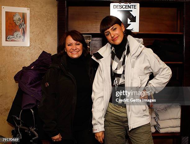 Actresses Liz Gallardo and Adriana Barraza pose with the Descente display at the Gibson Guitar celebrity hospitality lounge held at the Miners Club...