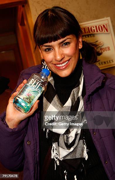 Actress Liz Gallardo poses with the Fiji display at the Gibson Guitar celebrity hospitality lounge held at the Miners Club during the 2008 Sundance...