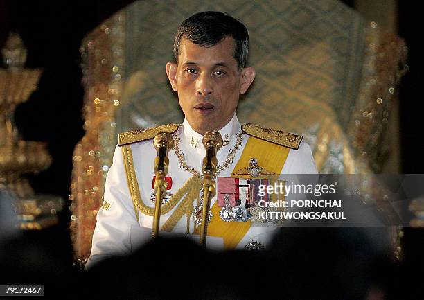 Thai Crown Prince Maha Vajiralongkorn reads statements during the opening session of the parliament at the parliament House in Bangkok, 21 January...