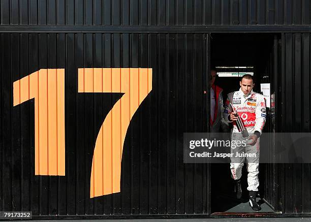 Lewis Hamilton of Great Britain and team McLaren Mercedes leaves the team's garage in between Formula one testing at the Ricardo Tormo racetrack on...