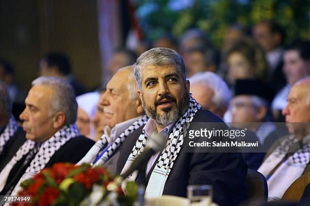Hamas leader Khaled Meshaal looks on during the opening of the National Palestinian Meeting in Damascus, Syria January 23, 2008. Oposition...