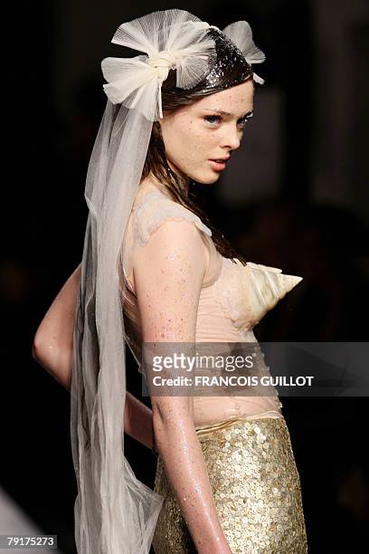 Model presents a creation by French designer Jean Paul Gaultier during Spring/Summer 2008 Haute Couture collection show in Paris, 23 January 2008....