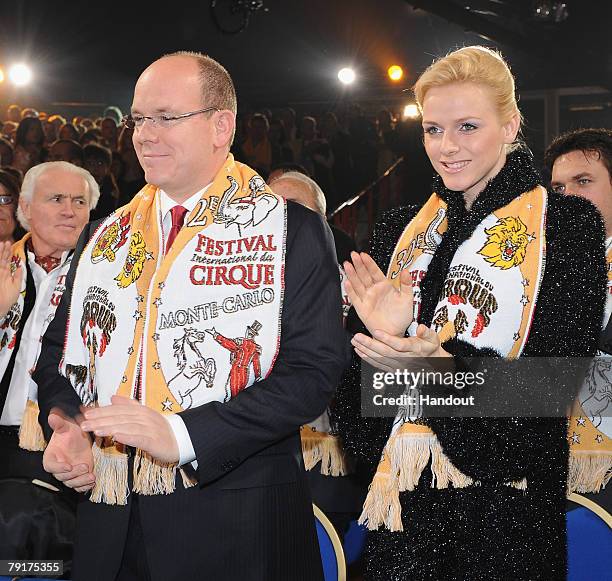 In this Handout picture Prince Albert II of Monaco and Charlene Wittstock attend the closing ceremony of the 32nd International Circus Festival of...