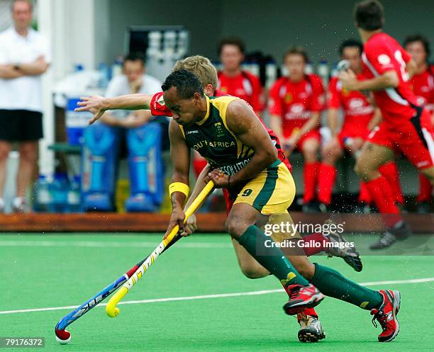 Emile Smith of South Africa fights for the ball during the Five Nations Mens Hockey tournament match between South Africa and Germany during the Five...