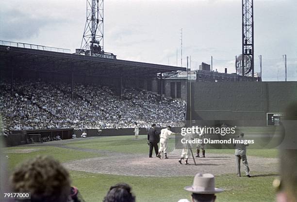 Outfielder Ted Williams of the Boston Red Sox crosses home plate after hitting a home run during a game on July 3, 1947 against the Philadelphia A's...