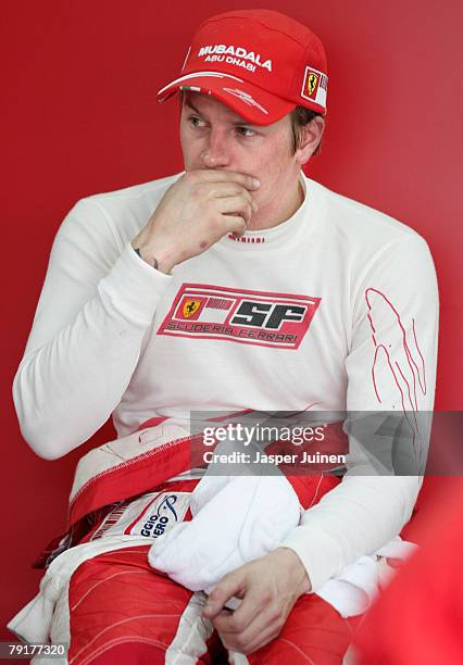 Kimi Raikkonen of Finland and team Ferrari sits inside his team's garage during Formula one testing at the Ricardo Tormo racetrack on January 23 in...