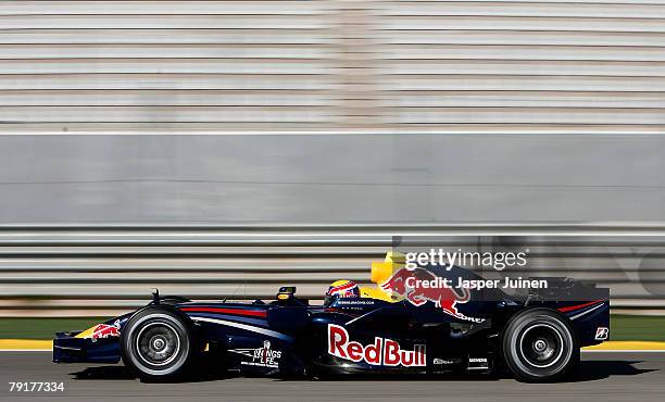 Mark Webber of Australia and Red Bull Racing steers his car during Formula one testing at the Ricardo Tormo racetrack on January 23 in Cheste near...