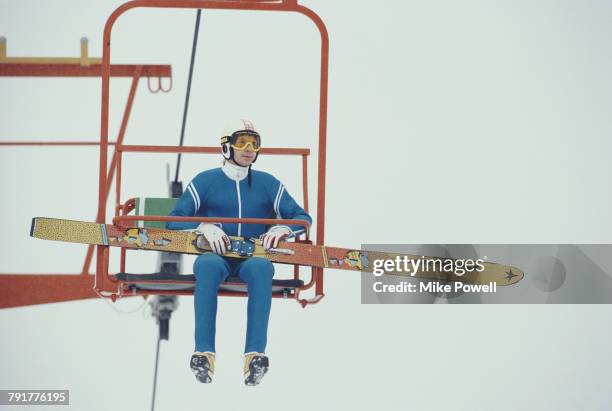 Matti Nykanen of Finland makes his way to the Men's 90m Large Hill by ski lift on 9 February 1988 at the XV Olympic Winter Games in Nakiska, Calgary,...