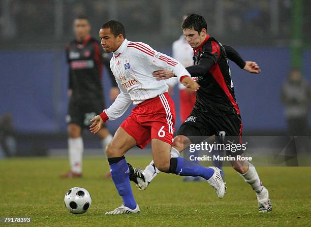 Vadis Odjidja new player of Hamburg and George Furuseth of Midtjyland compete for the ball during the friendly match between Hamburger SV and FC...