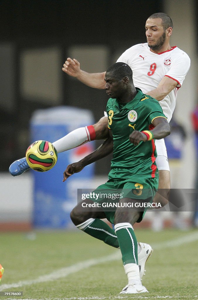 Senegal's defender Guirame Ndaw (L) and