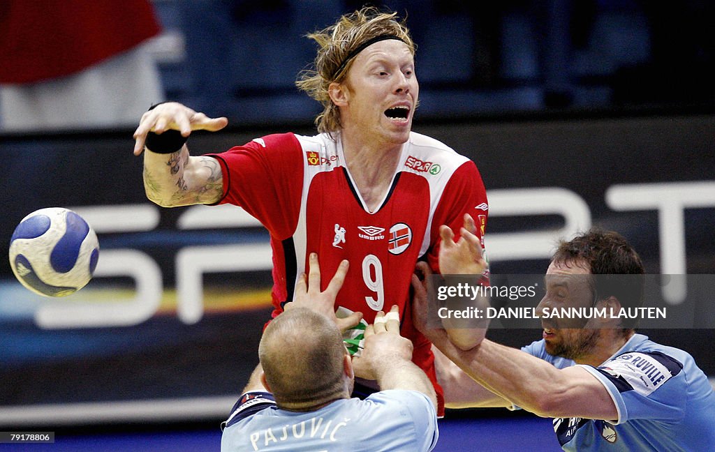 Norway's Borge Lund (C) vies for the bal