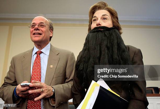 Rep. Jan Schakowsky wears a fake beard to show solidarity with striking members of Writers Guild of America during a comedic mock debate and news...