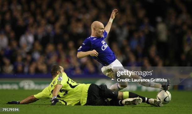 Alex of Chelsea battles with Andrew Johnson of Everton during the Carling Cup Semi Final Second Leg match between Everton and Chelsea at Goodison...