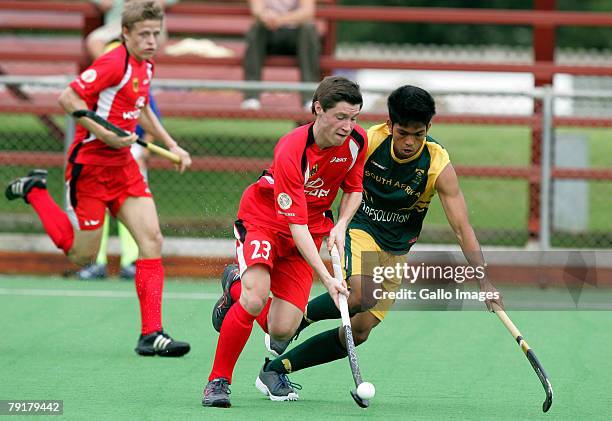 Shanyl Balwanth of South Africa and Martin Zwicker of Germany during the Five Nations Mens Hockey tournament match between South Africa and Germany...