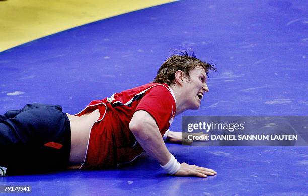 Norway's Frank Loke reacts during their 8th Men's European Handball Championship Main Round match against Slovenia, 23 January 2008 at the Stavanger...