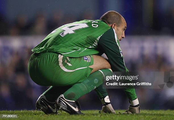 Tim Howard of Everton looks on after being defeated in the Carling Cup Semi Final Second Leg match between Everton and Chelsea at Goodison Park on...