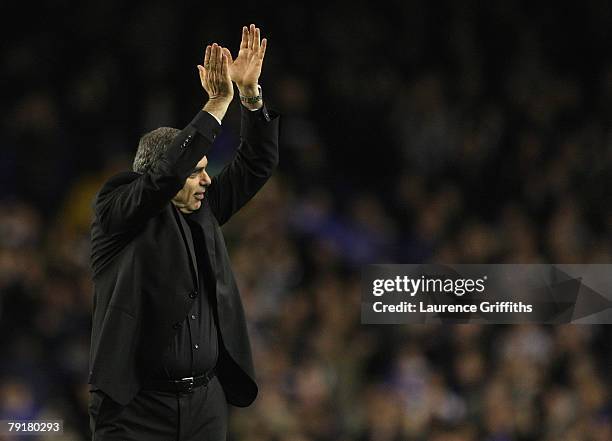 Avram Grant of Chelsea celebrates with the fans during the Carling Cup Semi Final Second Leg match between Everton and Chelsea at Goodison Park on...
