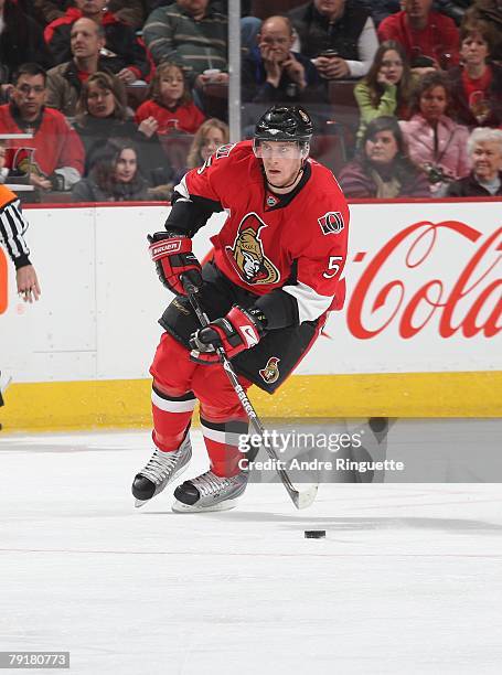 Christoph Schubert of the Ottawa Senators skates up ice with the puck against the Tampa Bay Lightning at Scotiabank Place on January 19, 2008 in...