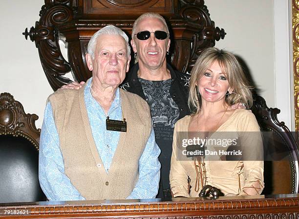 Bob Snider with son and Singer Dee Snider with wife Suzette Snider attend the ringing of the NYSE closing bell on January 23, 2008 in New York City.