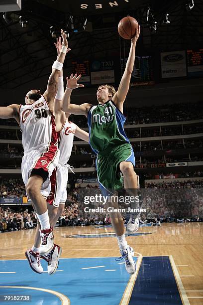 Dirk Nowitzki of the Dallas Mavericks goes up for a shot against Drew Gooden of the Cleveland Cavaliers during the game at the American Airlines...