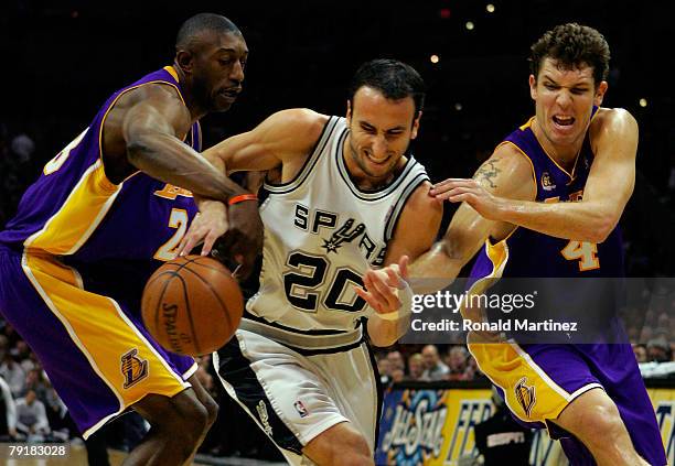 Guard Manu Ginobili of the San Antonio Spurs is pressured by Didier Ilunga-Mbenga and Luke Walton of the Los Angeles Lakers on January 23, 2008 at...