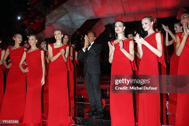 Valentino and Natalia Vodianova walk with models on the catwalk for final at the Valentino Fashion show, during Paris Fashion Week Spring-Summer 2008...