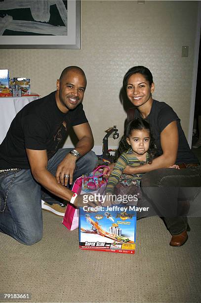 Actress Salli Richardson Whitfield, husband Dondre Whitfield and daughter Parker attend the Boom Boom Room Gifting Wonderland at the Century Plaza...