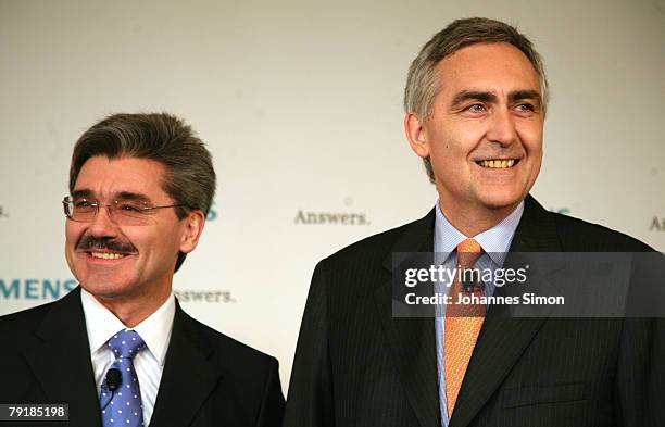 Peter Loescher , President and CEO of Siemens global powerhouse in electronics and electrical engineering, and CFO Joe Kaeser arrive for a press...