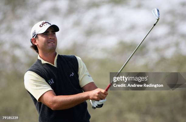 Anton Haig of South Africa hits his tee-shot on the eighth hole during the first round of the Commercialbank Qatar Masters at Doha Golf Club on...