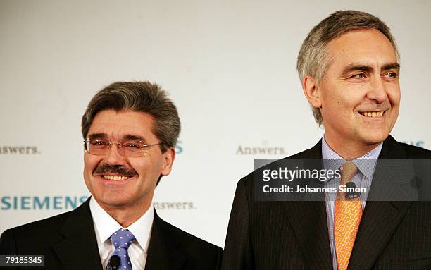 Peter Loescher , President and CEO of Siemens global powerhouse in electronics and electrical engineering, and CFO Joe Kaeser arrive for a press...