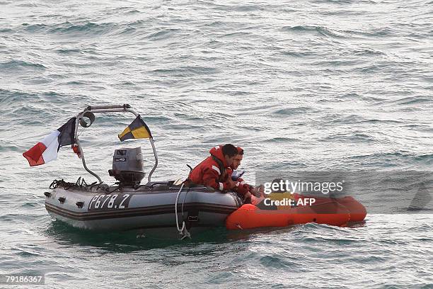 French Navy personnel rescue, the 48-year-old sole survivor from a small plane that plunged into the sea off the French coast, killing two other...