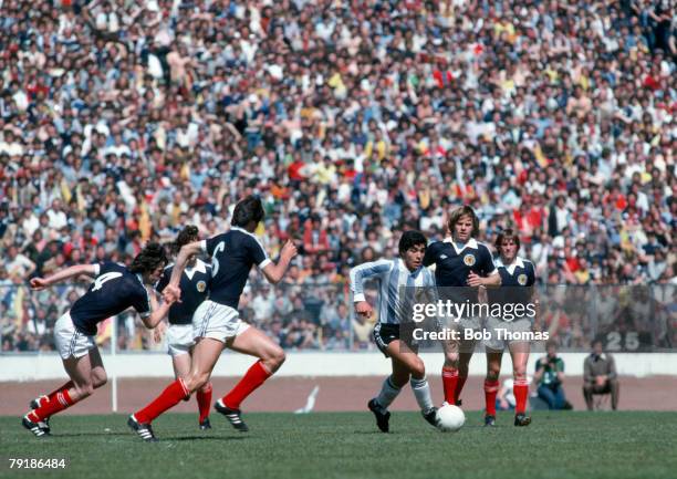 Argentina's Diego Maradona surrounded by 5 Scottish players during a friendly international match at Hampden Park, Glasgow, 2nd June 1979. Scottish...