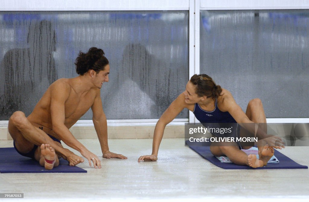 French swimmer Laure Manaudou (R) stretc